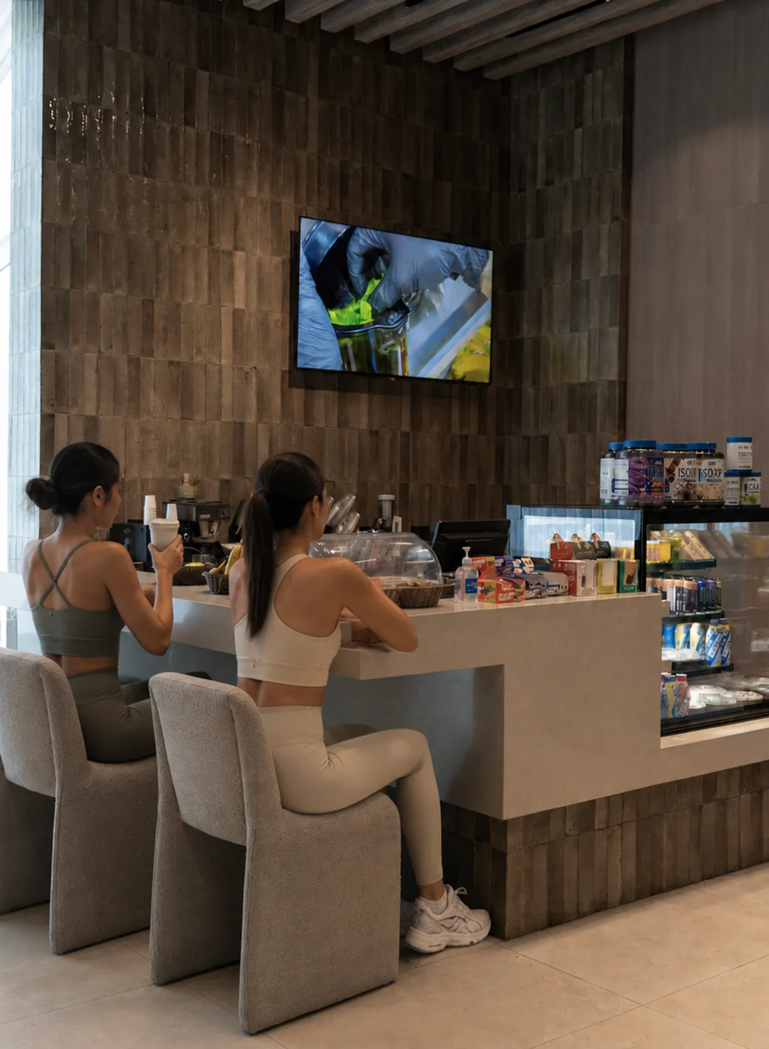 Members at the juice bar at Vy Boutique